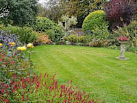 LG Garden Services logo, gardener in Henley-on-Thames