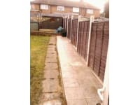 Ennis Landscapes logo, gardener in London