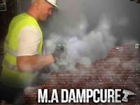 M A Dampcure logo, damp proofer in Salford