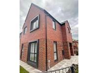 A D Brickwork Building Services logo, bricklayer in Middleton